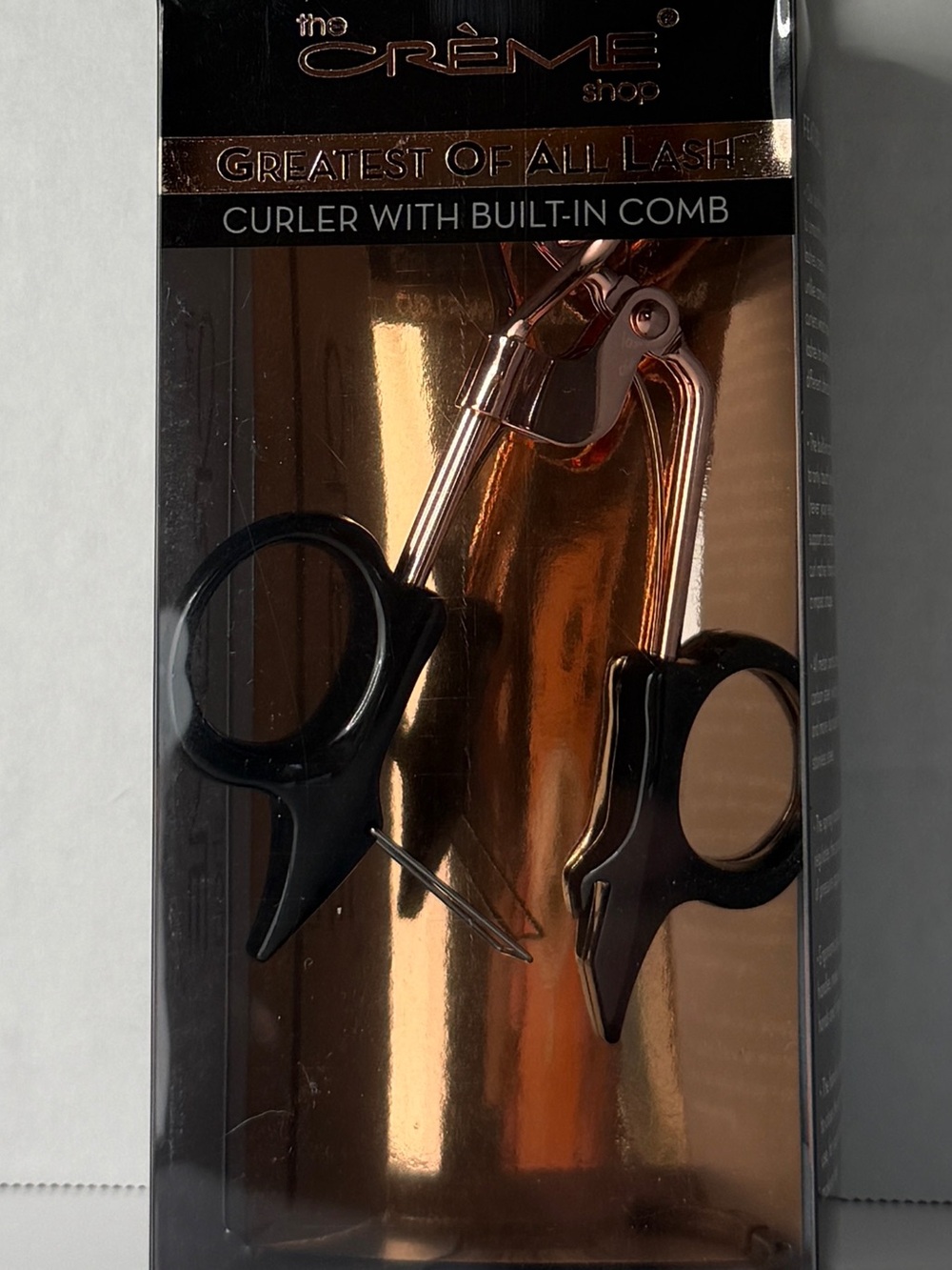 The Crème Shop Rose Gold Eyelash Curler with Built-In Comb - Black Handles